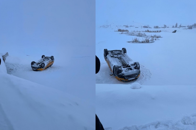 Yoldan çıkan taksi takla attı, donma tehlikesi geçirdi